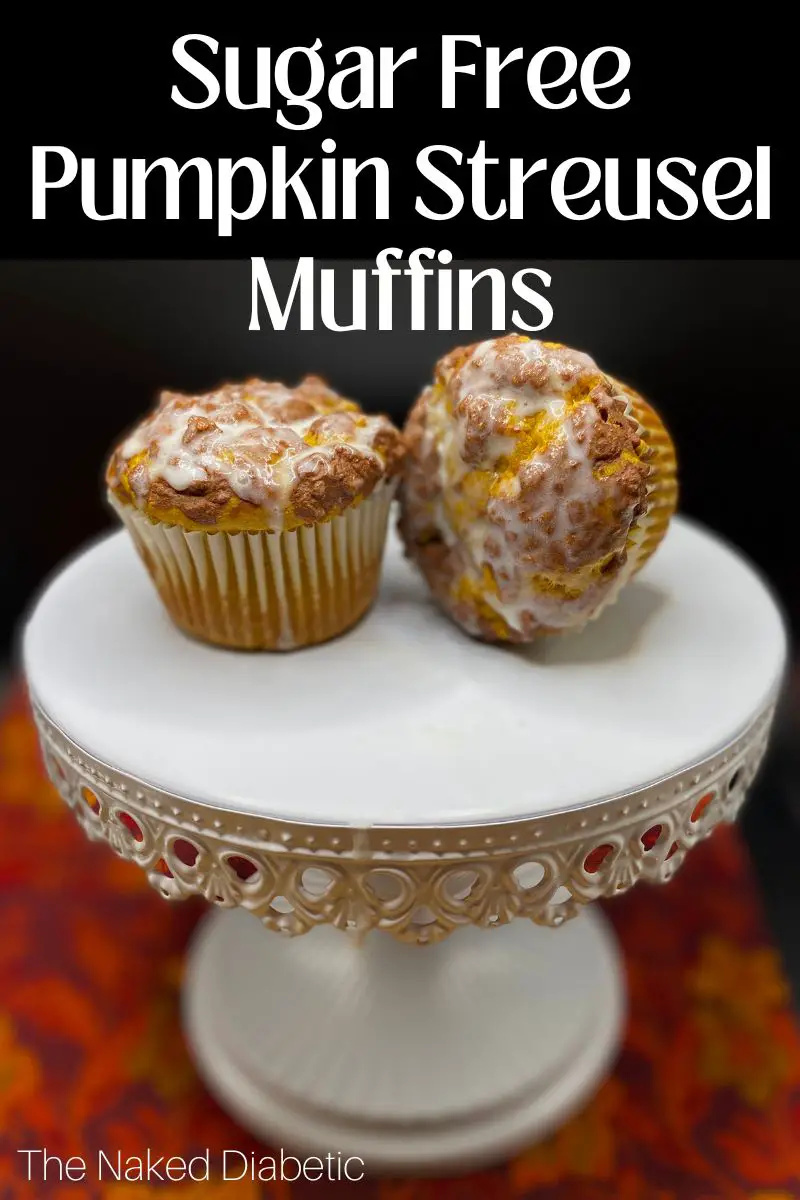 picture of sugar free pumpkin streusel muffins on a white cake stand